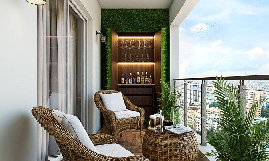 Small balcony design with a  hidden bar with a pair of bar stools and pendant lights