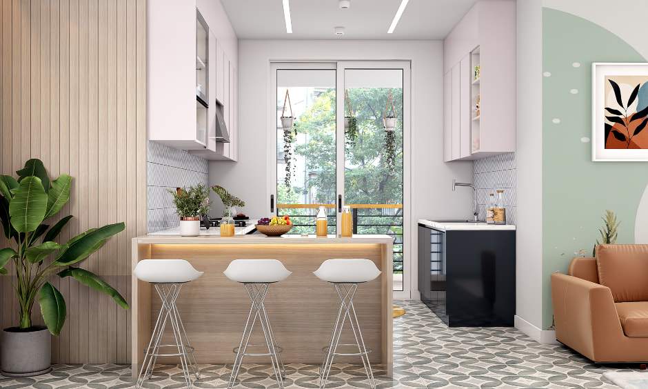 A parallel kitchen with a breakfast counter is designed in black and white