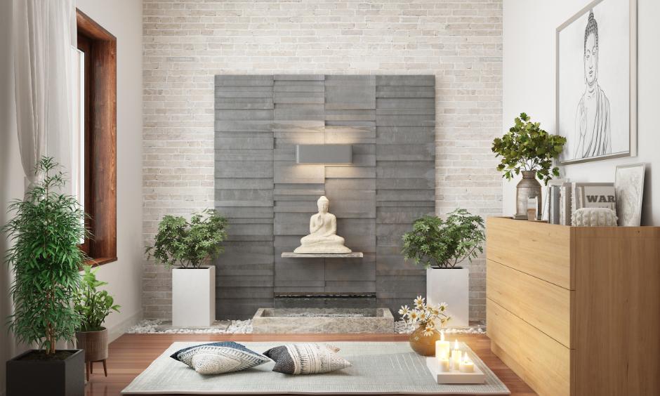 Neutral-toned meditation room with indoor plants and a Buddha statue for home Vastu