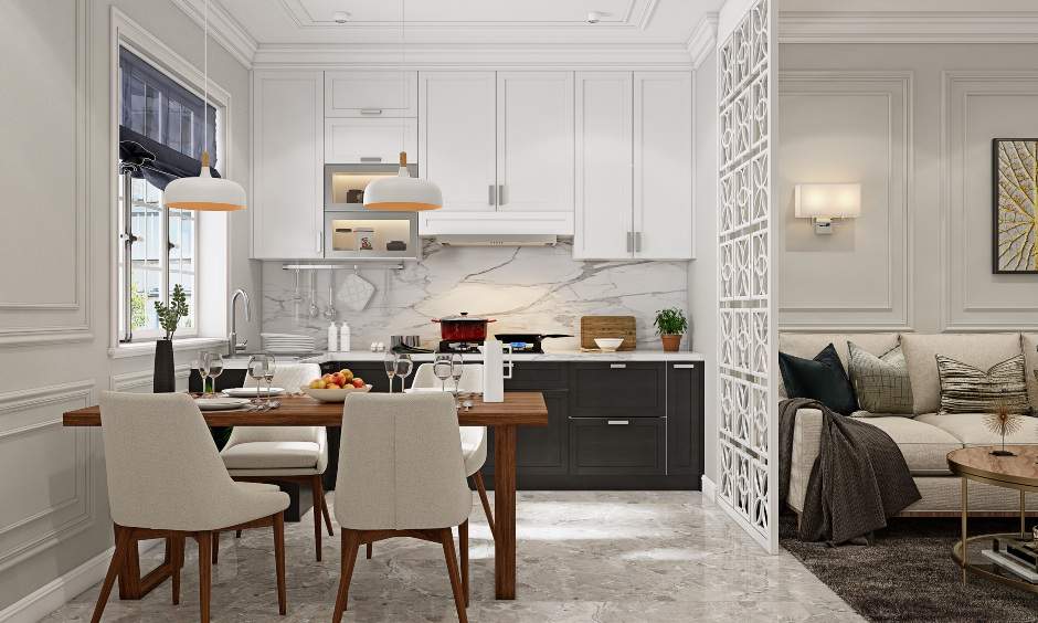 Dining room interior design which is Neo-classical and wooden table with four cushioned chairs where the jali partition separates the kitchen and dining area