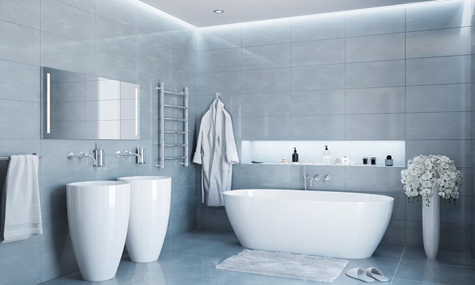 Grey bathroom with minimalist fixtures and Vastu colours promoting hygiene and clarity