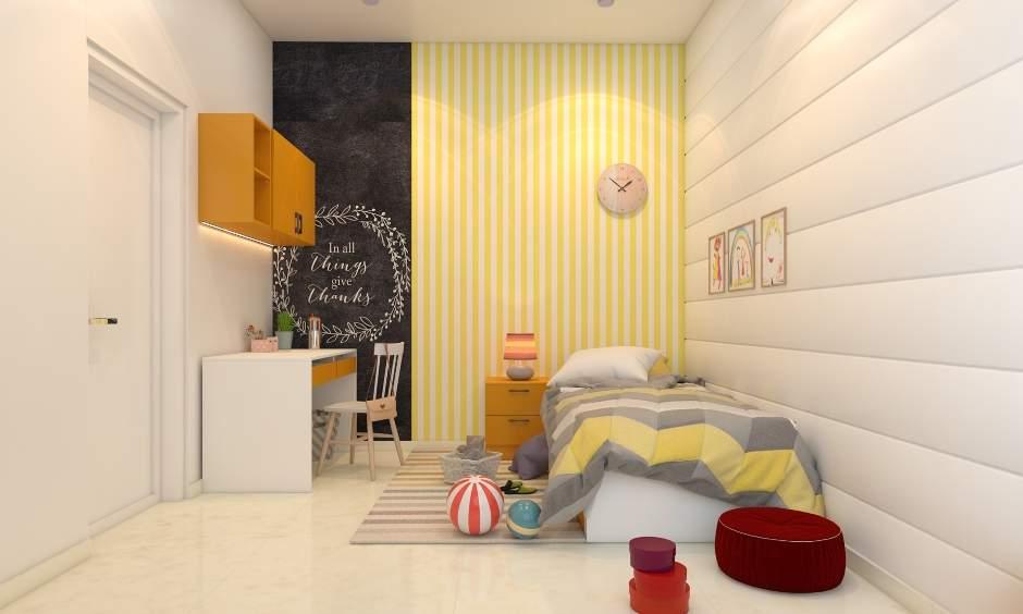 Kids' room vastu with cheerful green, blue, and yellow walls for a bright, positive atmosphere