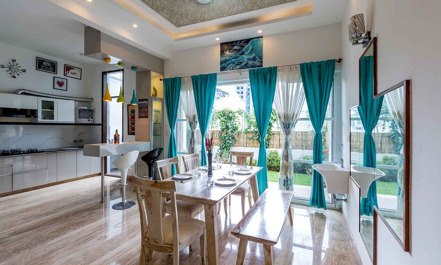 home interior design bangalore with dining area that blends with the kitchen