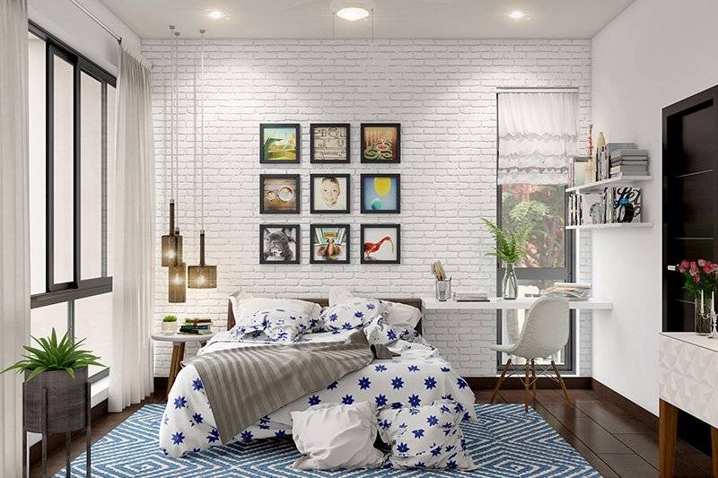 Interior design bedroom furniture with a brick wallpaper on the wall and a side table for work with a couple of book shelves