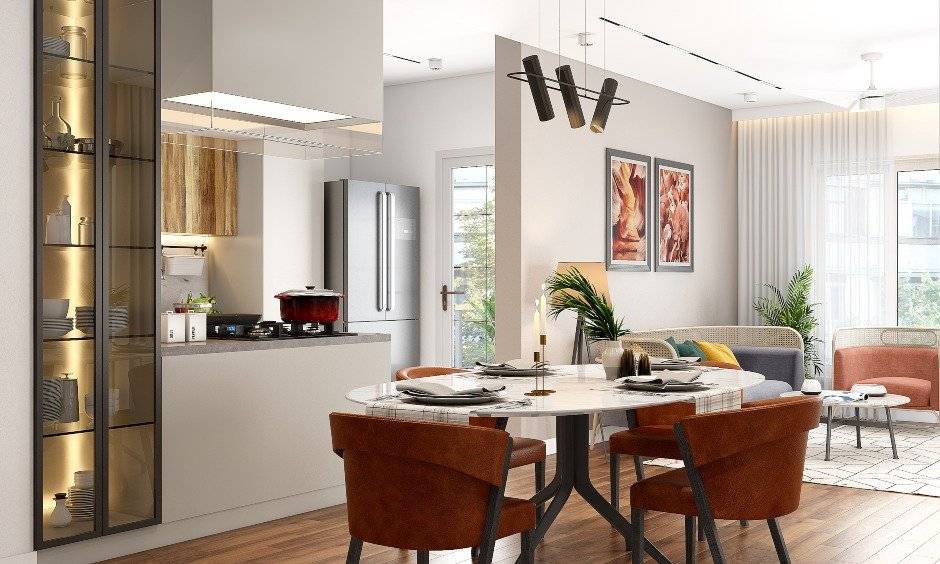 Interior design photos for 3bhk flat with a dining table in front of a modular kitchen and a tall crockery unit beside it