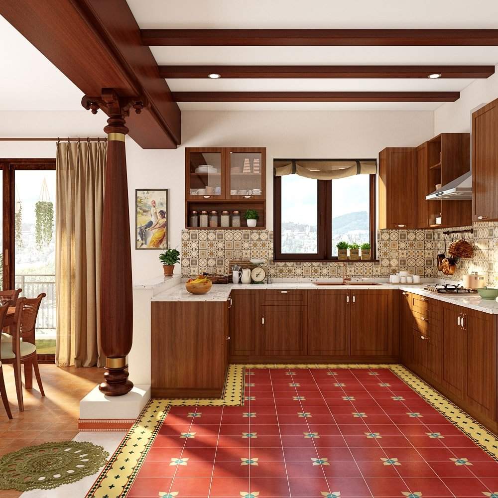 Interior designers in Chennai designed a U-shaped kitchen with glass cabinets