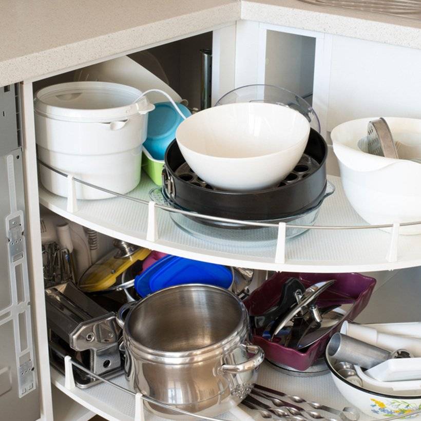 Kitchen organiser india with pull out circular drawers below the countertop which perfectly suits for small kitchen organisation