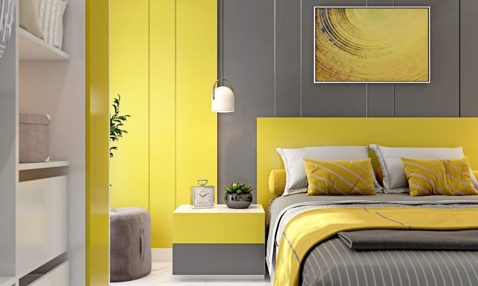 Latest bedroom interiors design with headboard in yellow and sidetable for storage