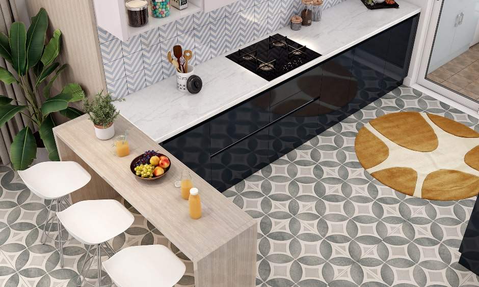 Light wood breakfast counter with three stools