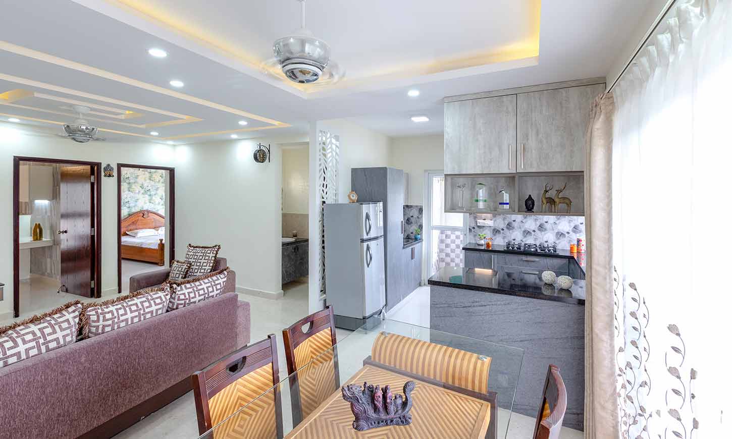 list of interior contractors in bangalore designed beautiful living room with open kitchen and dining room