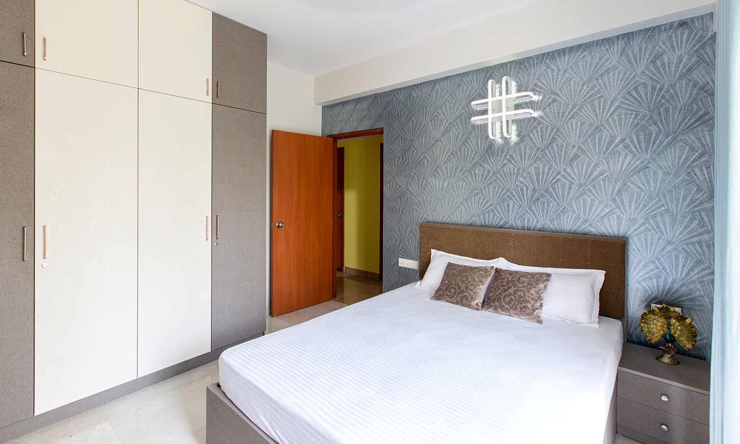 low cost interior designers in bangalore with bedroom designed in blue pattern