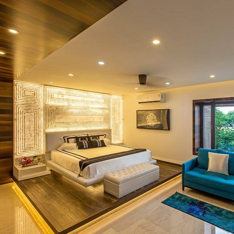 Master bedroom wall decor with custom patterns on feature wall using lights its makes beautiful bedroom wall design