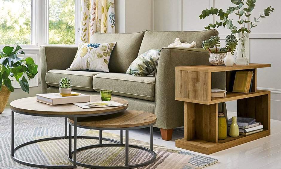 The modern kid friendly living room features a round nested coffee table