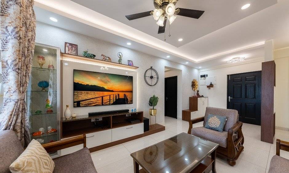 A living room TV unit in Whitefield that blends traditional and modern interior design