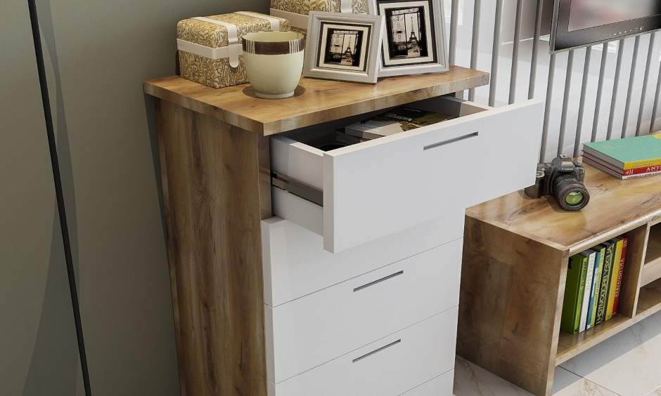 Living room interior with a cupboard-drawers attached to TV unit to save space in small indian homes
