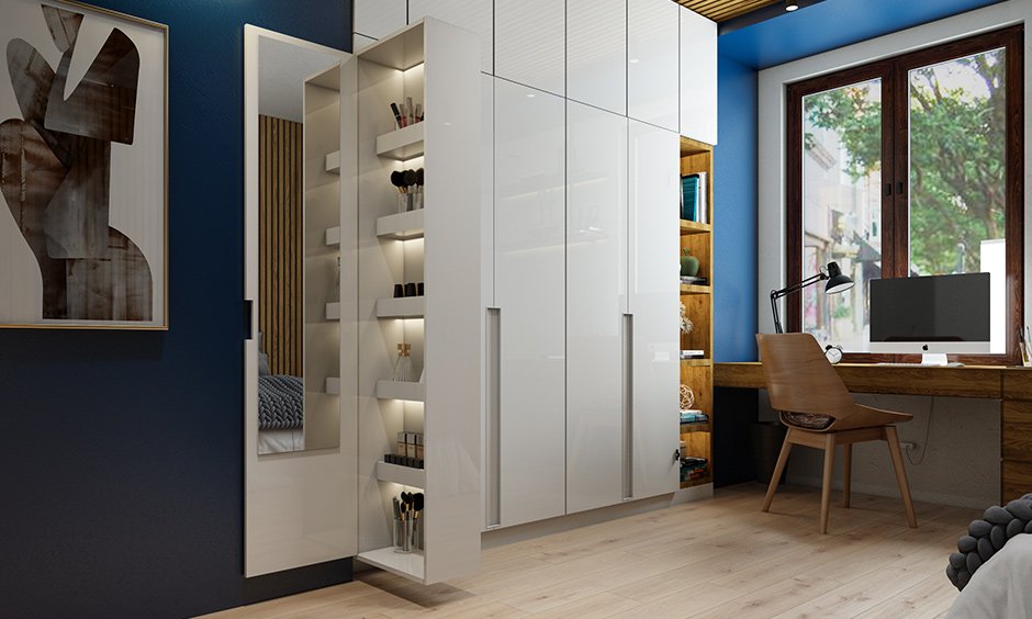 Multifunctional wardrobe with a dresser unit is a smart space saving design for small indian homes