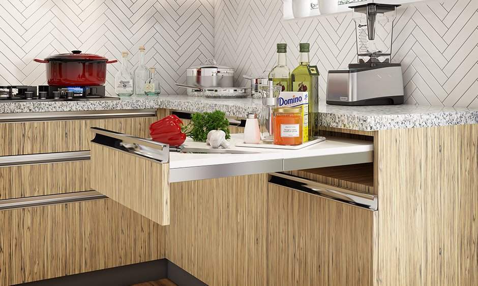 Multipurpose furniture design with a sturdy, durable chopping board pulls out in a kitchen