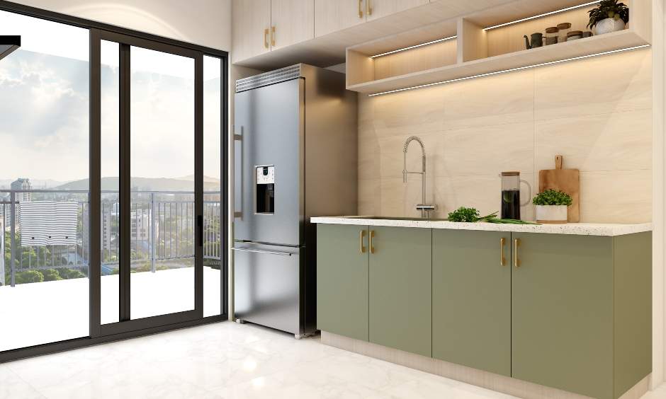 A parallel kitchen with a sliding glass door leading to a balcony