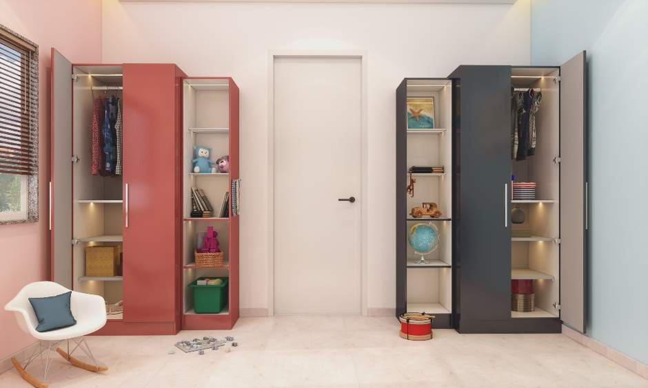 Kids' bedroom has pink and grey wardrobes with multiple compartments to assist in organizing clothing