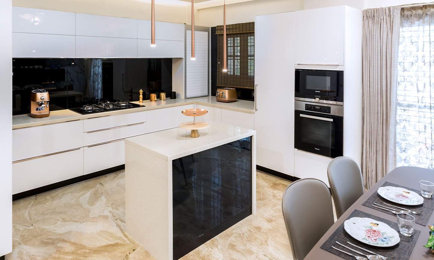 White modular kitchen designed by residential interior design bangalore
