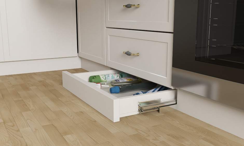 Skirting drawer for l shaped modular kitchen interior designers in bangalore, mumbai and hyderabad