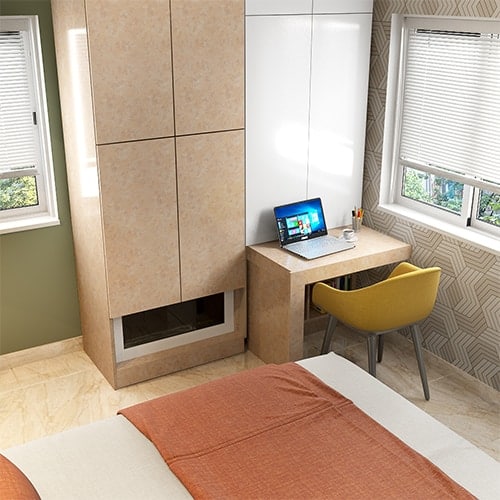 Space saving home interiors Coimbatore with a wardrobe pull-out study table
