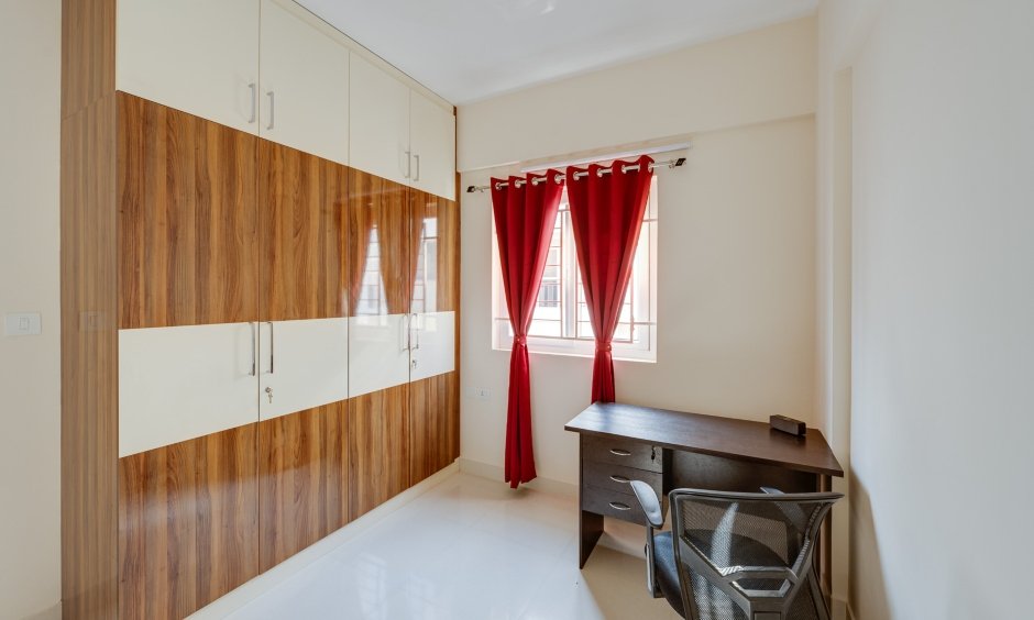 Study room with modern wardrobe design in 3 BHK flat, Whitefield