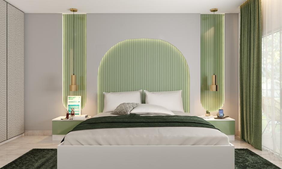 Green bedroom with light walls and wooden accents creating a calm and balanced atmosphere